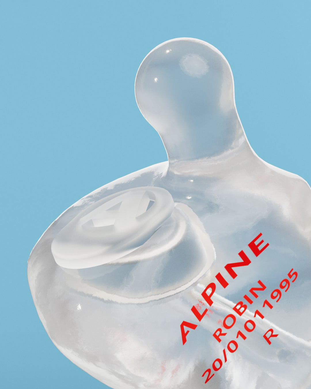 Close-up of an Alpine MusicSafe Custom Transparent earplug with filter and the engraving &