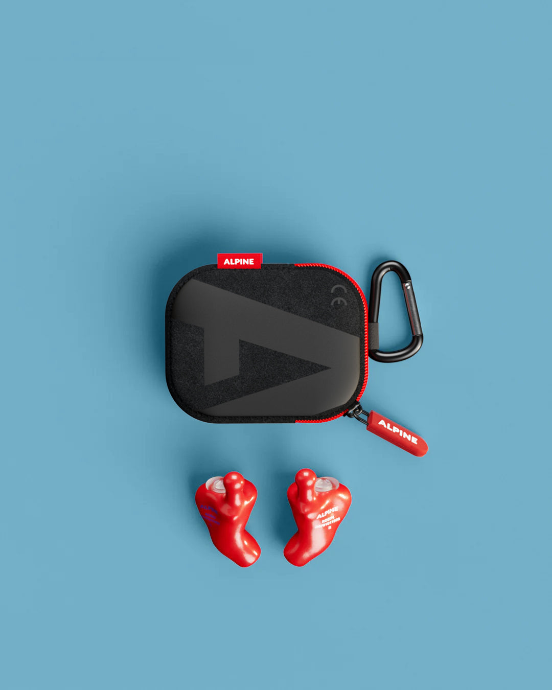 Alpine MusicSafe Custom Red earplugs with black carrying case, top view