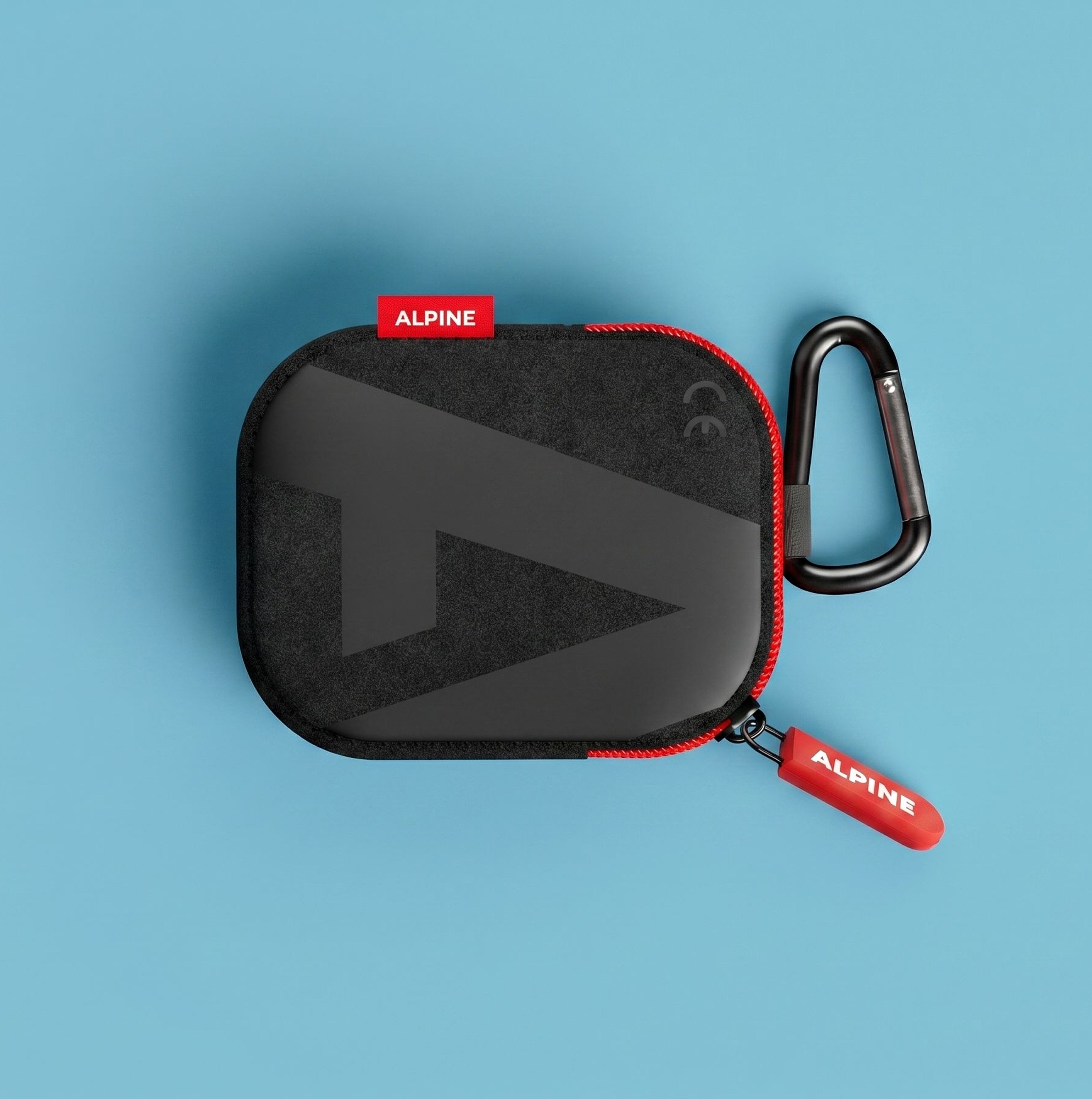 Black carrying case with carabiner for Alpine SleepSoft Custom Yellow earplugs, top view 
