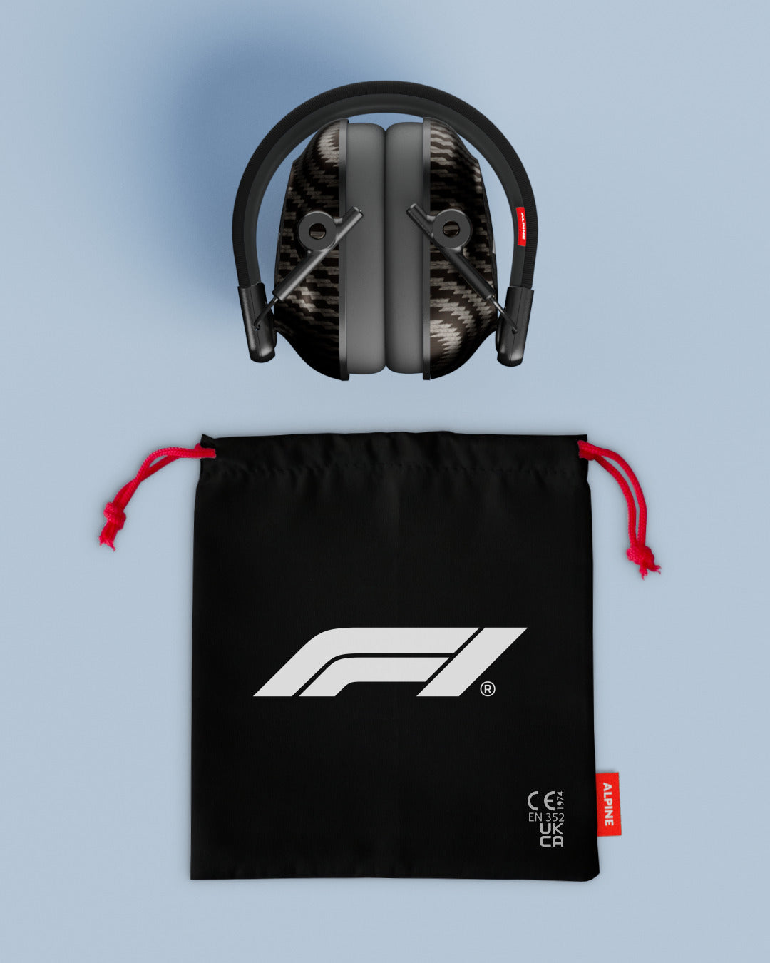 Alpine Formula 1® Earmuffs with black F1 drawstring storage bag, top view 