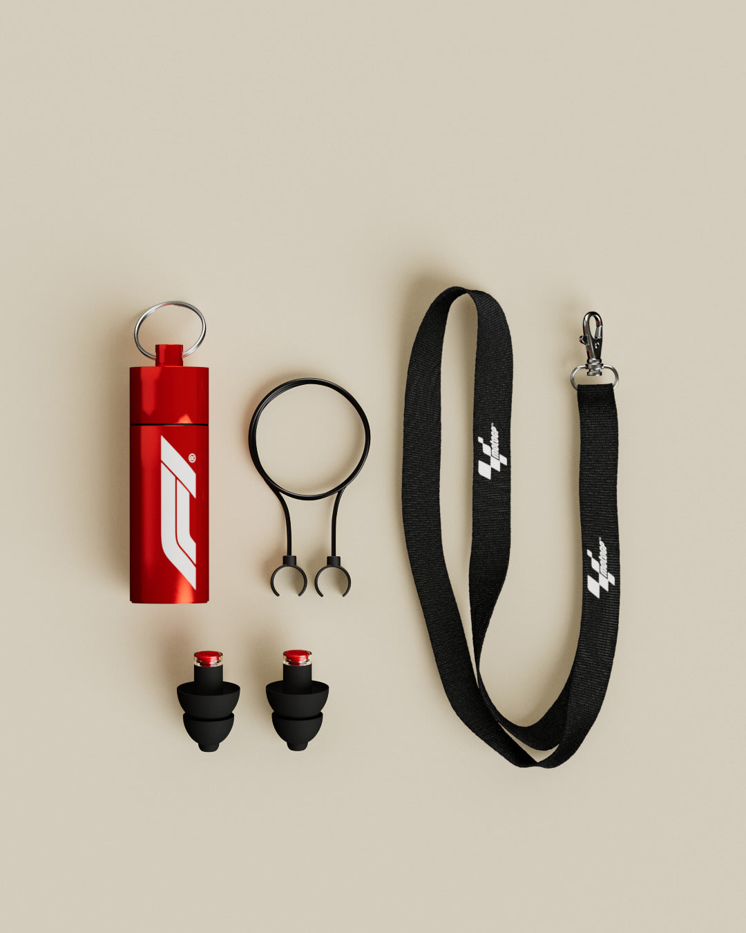 Alpine Formula 1® Earplugs with red Formula 1® carrying tube, safety cord and lanyard, top view 