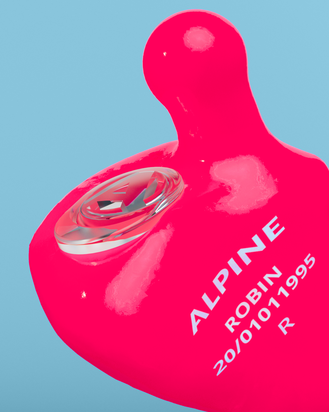 Close-up of an Alpine MusicSafe Custom Neon Pink earplug with filter and the engraving &