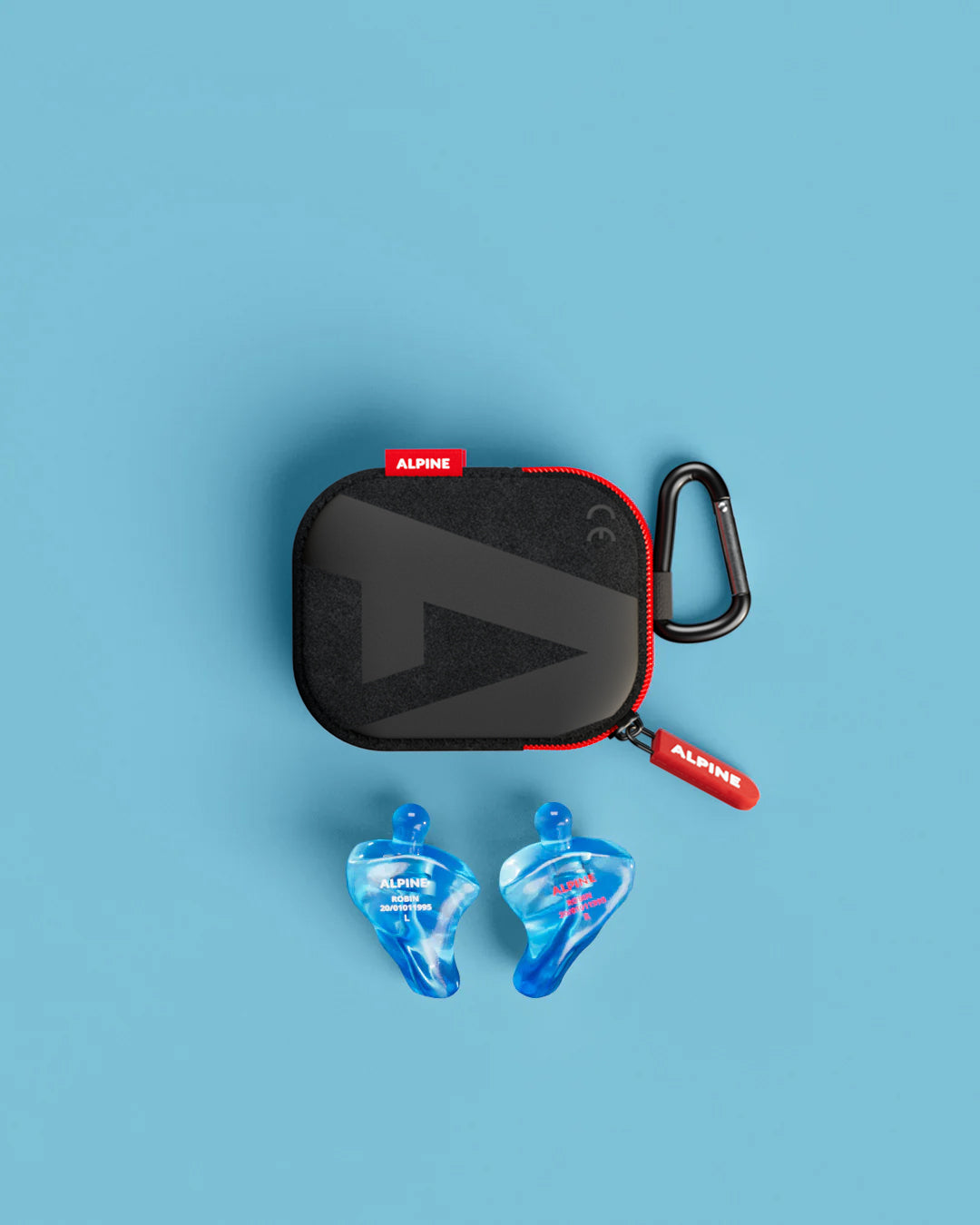 Alpine PartyPlug Custom Transparent Blue earplugs with black carrying case, top view 
